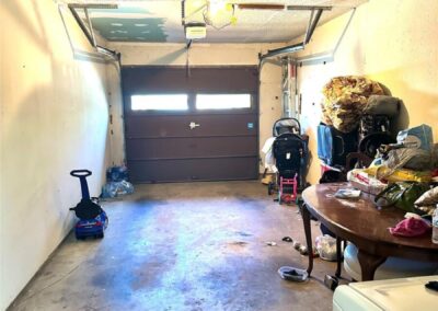 Garage interior view of duplex for sale at 6510 Oak Forest Court