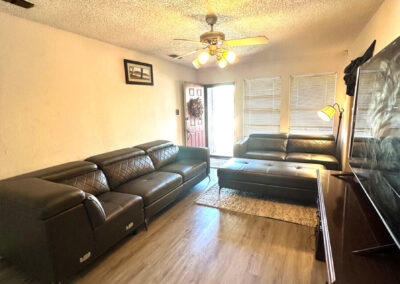 Living Area view of 6510 Oak Forest Ct Fort Worth Duplex with phrase Live Auction Overlaid