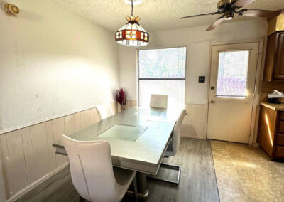 Dining Area view of 6510 Oak Forest Ct Fort Worth Duplex with phrase Auction Overlaid