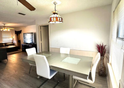 Dining Area view of 6510 Oak Forest Ct Fort Worth Duplex with phrase Real Property Auction Auctioneer Live on Site Overlaid